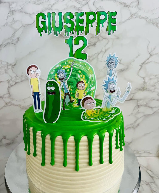 Birthday cake with green icing and cartoon character toppers on a marble background