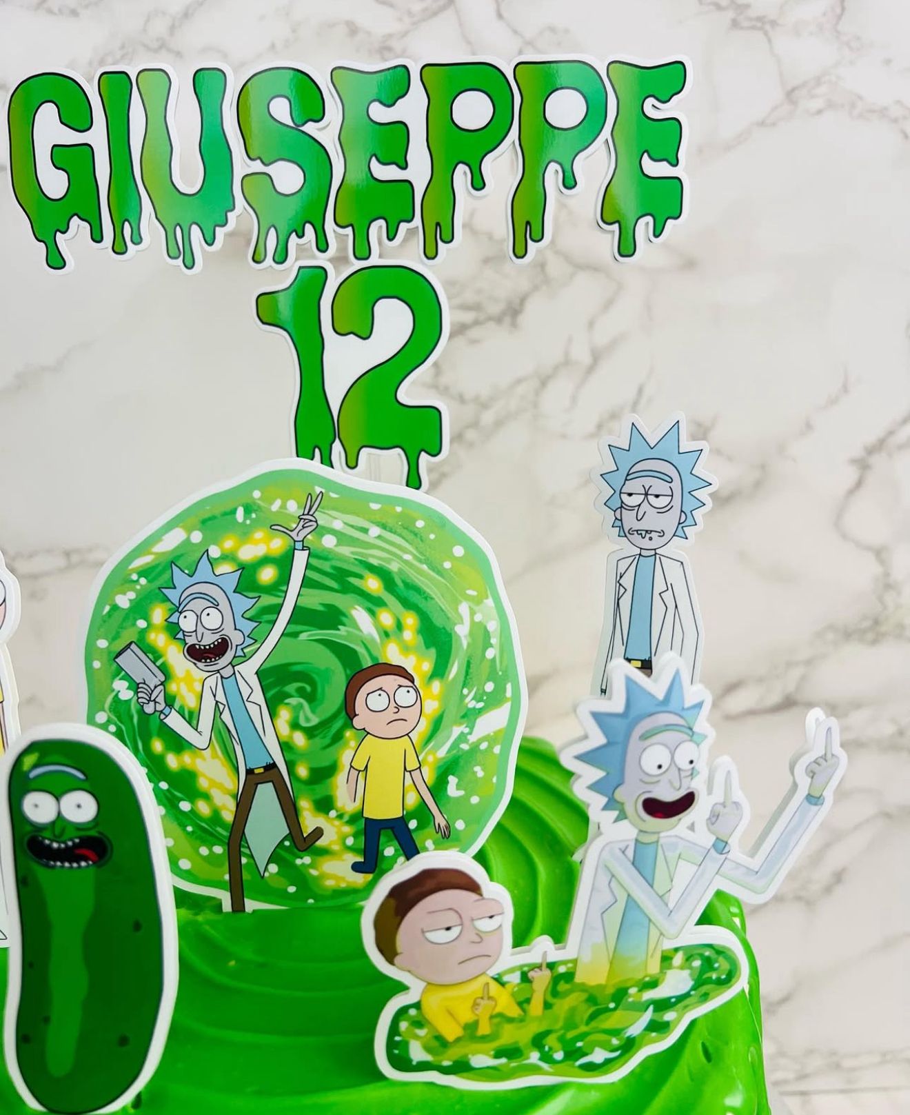Cartoon character stickers with 'Giuseppe 12' text on a marble background